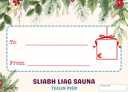 Blank Christmas gift voucher template for Sliabh Liag Sauna at Teelin Pier, featuring festive greenery and space to write gift details.